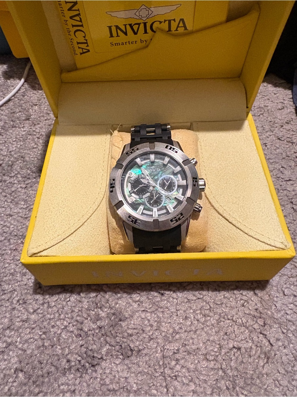 Invicta Men's Silver Case Watch with Black Strap and Green Accents